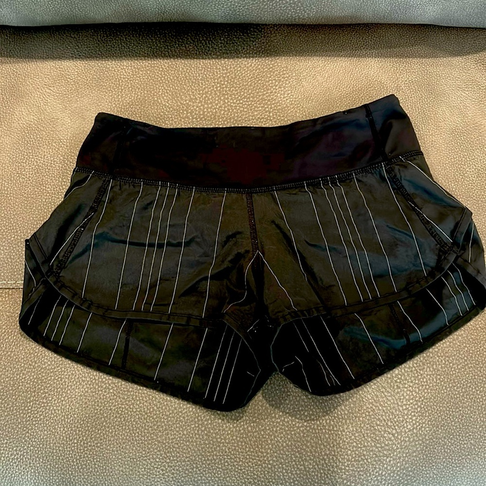Black with thin silver strip lululemon shorts